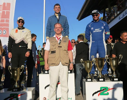 HRH Prince Feisal, the chairman of Jordan Motorsport, poses with the 2016 winners of Al Hussein Rumman Hill Climb, Khatsheek Shadian (centre), Mohammed Tayseer (right) and Saher Fatafteh (left), on Friday (Photo courtesy of Jordan Motorsport)